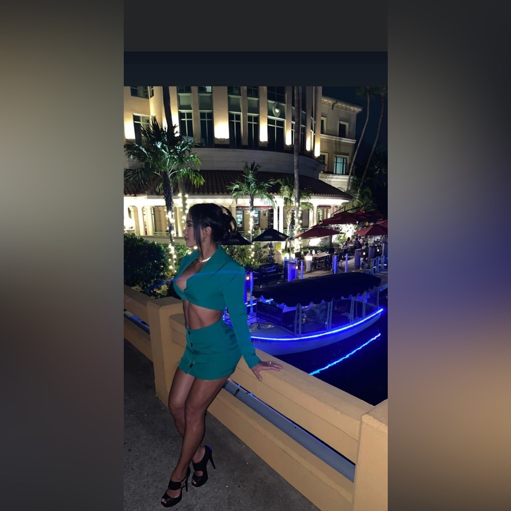 Short green jumpsuit , worn once